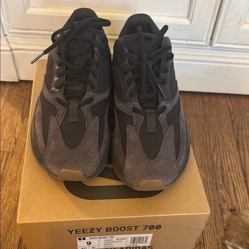Yeezy Black Sneakers with Chunky Design and Reflective Accents